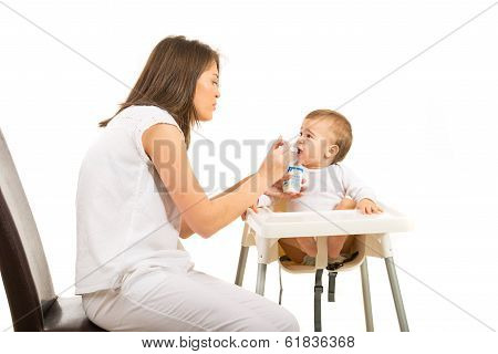 Mother Feeding Toddler Boy