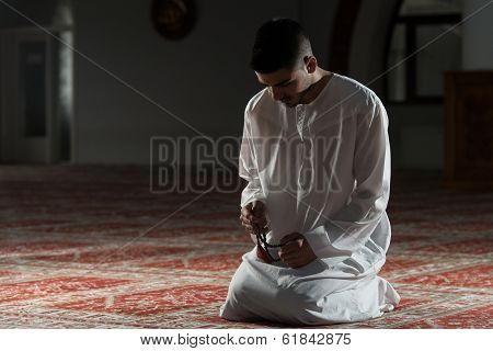 Young Muslim Man Praying