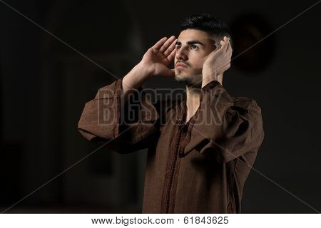 Young Muslim Man Praying