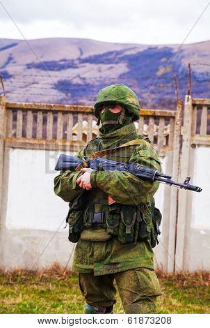 Russian Soldier Guarding An Ukrainian Naval Base In Perevalne, Crimea