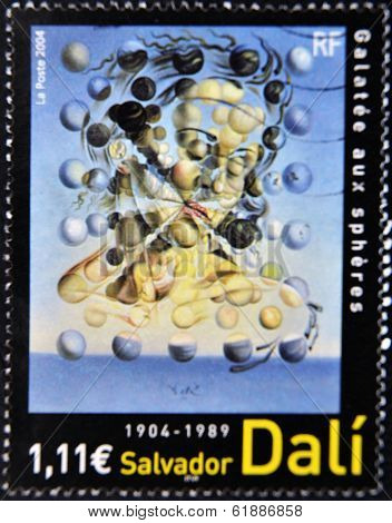 A stamp printed in France shows the work 