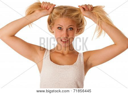 Beautiful Young Blonde Woman Holds Hair In Her Hand Gesturing Excitement Isolated Over White Backgro