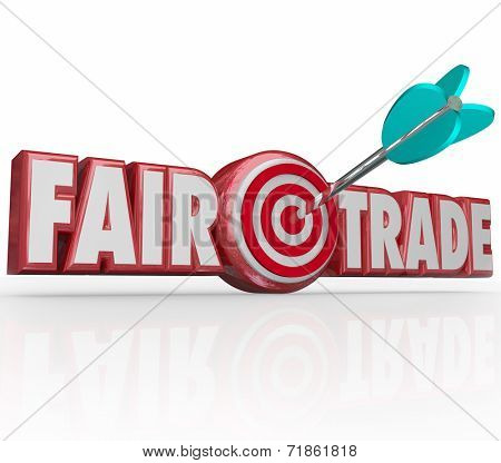 Fair Trade words in red 3d letters and an arrow in the bulls-eye to illustrate supply chain planning that is responsible to the environment and workers rights