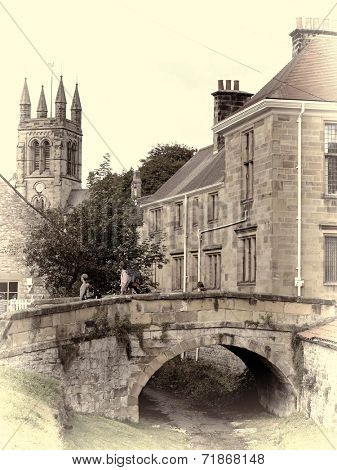 View of bridge in Helmsley, North Yorkshire with vintage effect added.
