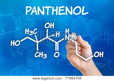 Hand with pen drawing the chemical formula of Panthenol