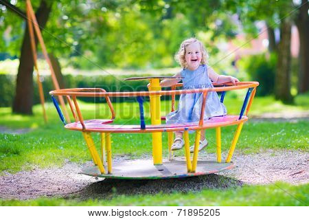 Little Girl On A Playground