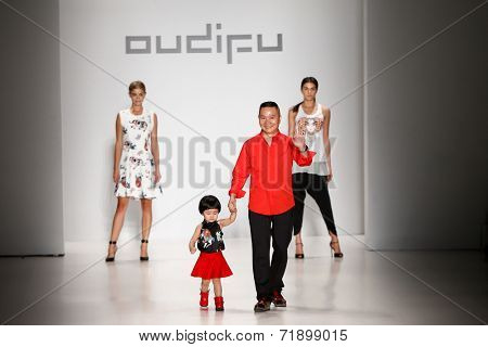 NEW YORK-SEP 8: (L-R) Danielle Knudson, designer Zhuliang Li & Miss Teen USA K. Lee Graham at OUDIFU fashion show at Mercedes-Benz Fashion Week at Lincoln Center on September 8, 2014 in New York City.