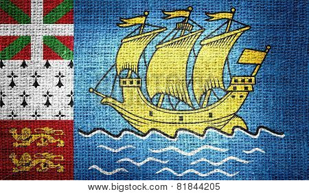 Saint Pierre and Miquelon flag on burlap fabric