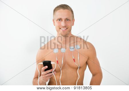 Young Man With Electrodes On Chest