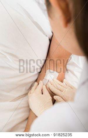 Close-up Of A Iv Drip In Patient's Hand