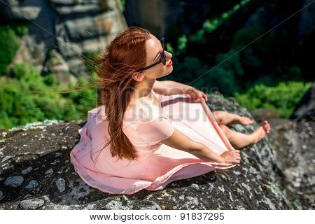 Woman enjoying nature on the mountains