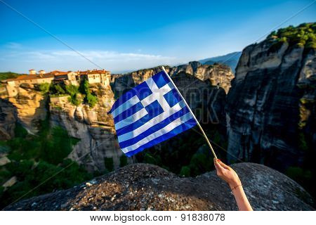 Greek flag on the mountains background