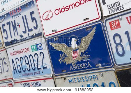 Stand with American license plate
