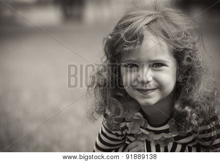 Black And White Portrait Of Cute Little Girl In A Park. Close-up Of Beautiful Child, Outdoors - Grey