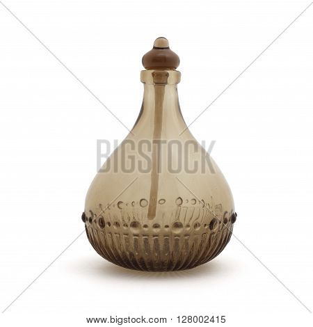Vintage blown glass beautiful perfume sepia bottle isolated on white background