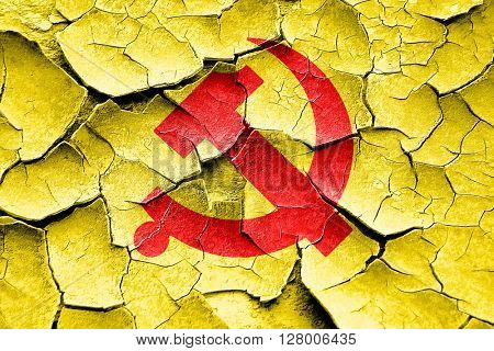 Grunge cracked Communist sign with red and yellow colors