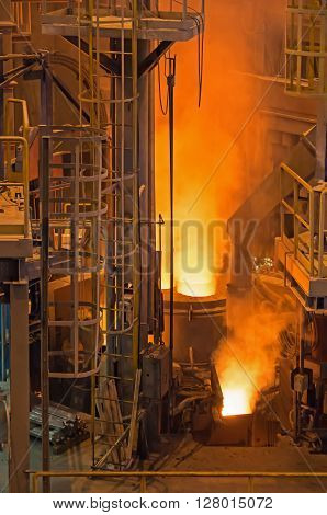 Photograph shows the active stage melting of steel electrically on modern technology