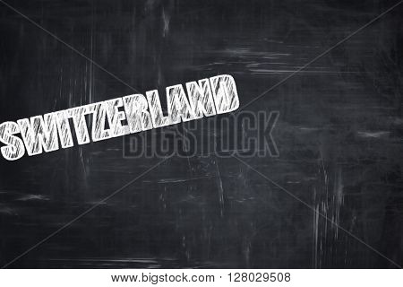 Chalkboard background with chalk letters: Greetings from switzer