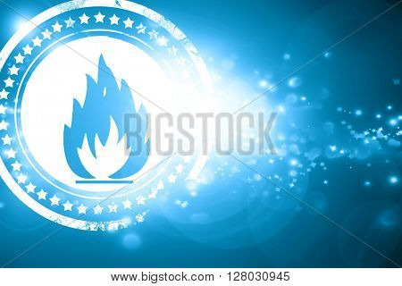 Blue stamp on a glittering background: Flammable hazard sign
