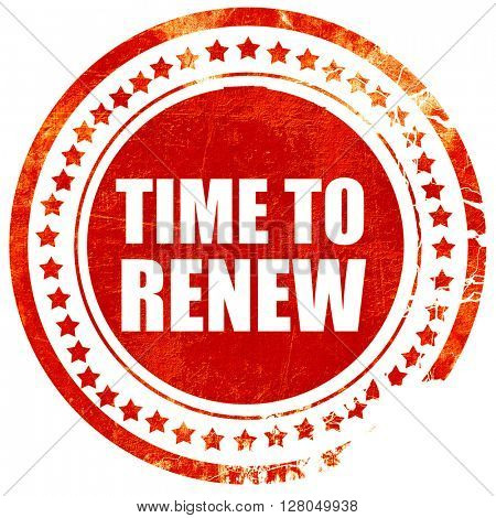 time to renew, grunge red rubber stamp on a solid white backgrou