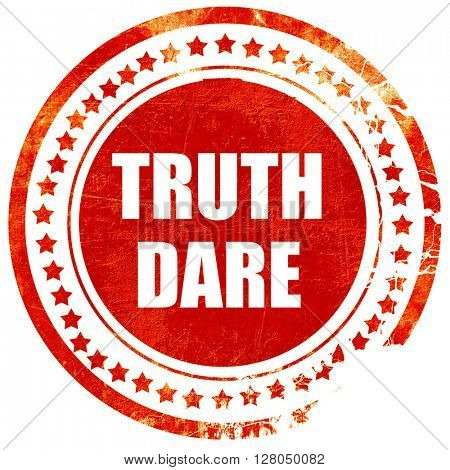 truth or dare, grunge red rubber stamp on a solid white backgrou
