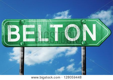 belton road sign , worn and damaged look