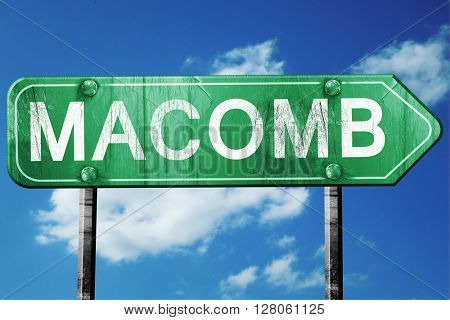 macomb road sign , worn and damaged look