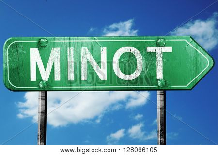 minot road sign , worn and damaged look