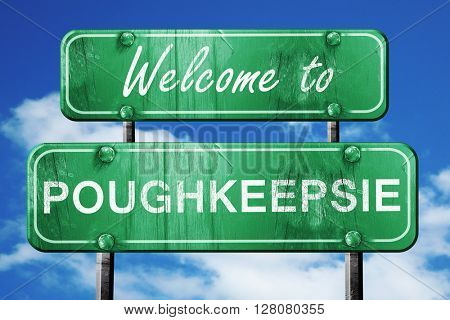 poughkeepsie vintage green road sign with blue sky background
