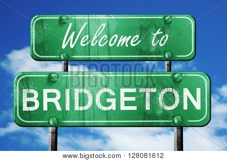 bridgeton vintage green road sign with blue sky background