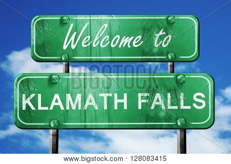 klamath falls vintage green road sign with blue sky background