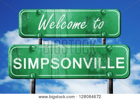 simpsonville vintage green road sign with blue sky background