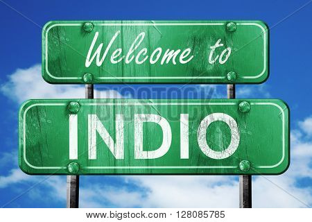 indio vintage green road sign with blue sky background