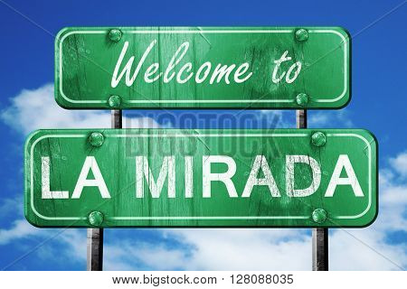 la mirada vintage green road sign with blue sky background
