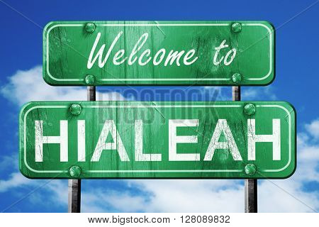 hialeah vintage green road sign with blue sky background