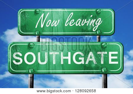 Leaving southgate, green vintage road sign with rough lettering