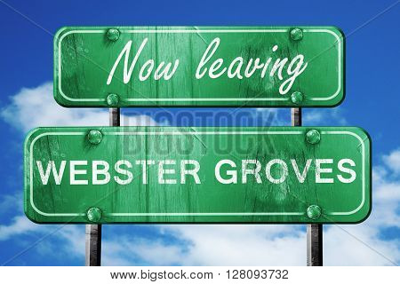 Leaving webster groves, green vintage road sign with rough lette