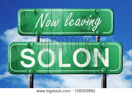 Leaving solon, green vintage road sign with rough lettering