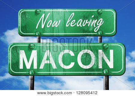 Leaving macon, green vintage road sign with rough lettering