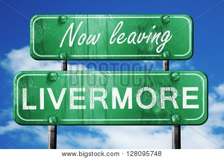 Leaving livermore, green vintage road sign with rough lettering