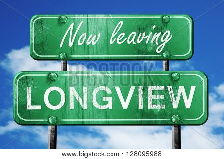 Leaving longview, green vintage road sign with rough lettering