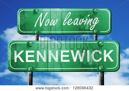 Leaving kennewick, green vintage road sign with rough lettering