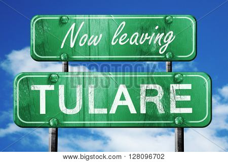 Leaving tulare, green vintage road sign with rough lettering