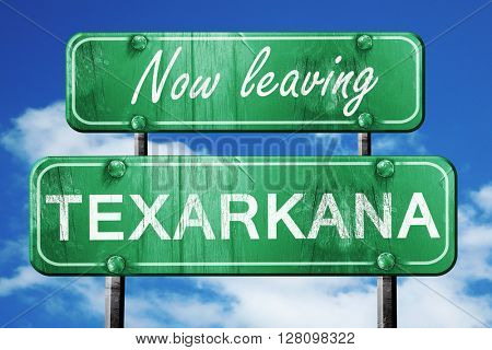 Leaving texarkana, green vintage road sign with rough lettering