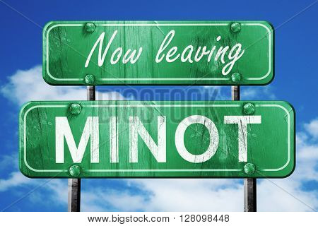Leaving minot, green vintage road sign with rough lettering