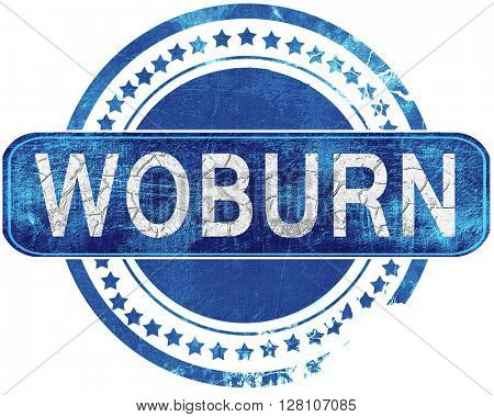 woburn grunge blue stamp. Isolated on white.