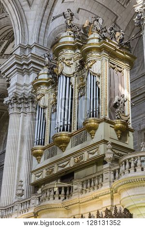 JAEN SPAIN - may 2 2016: View of the monumental organ located within the choir, typically Spanish, baroque style with horizontal tubes in both facades, Spain