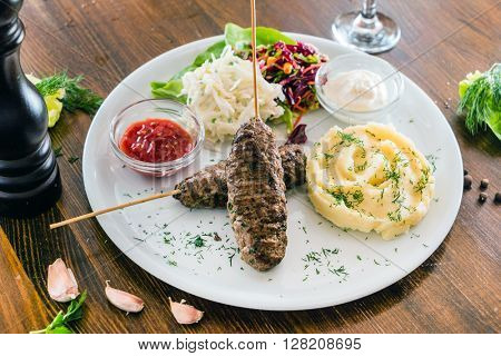 kebab with mashed potatoes
