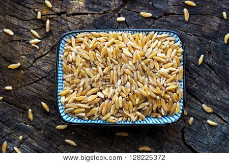 Organic Kamut Grain On Wooden Background