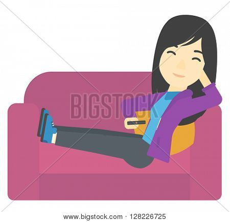 Woman sitting on the couch with remote control.
